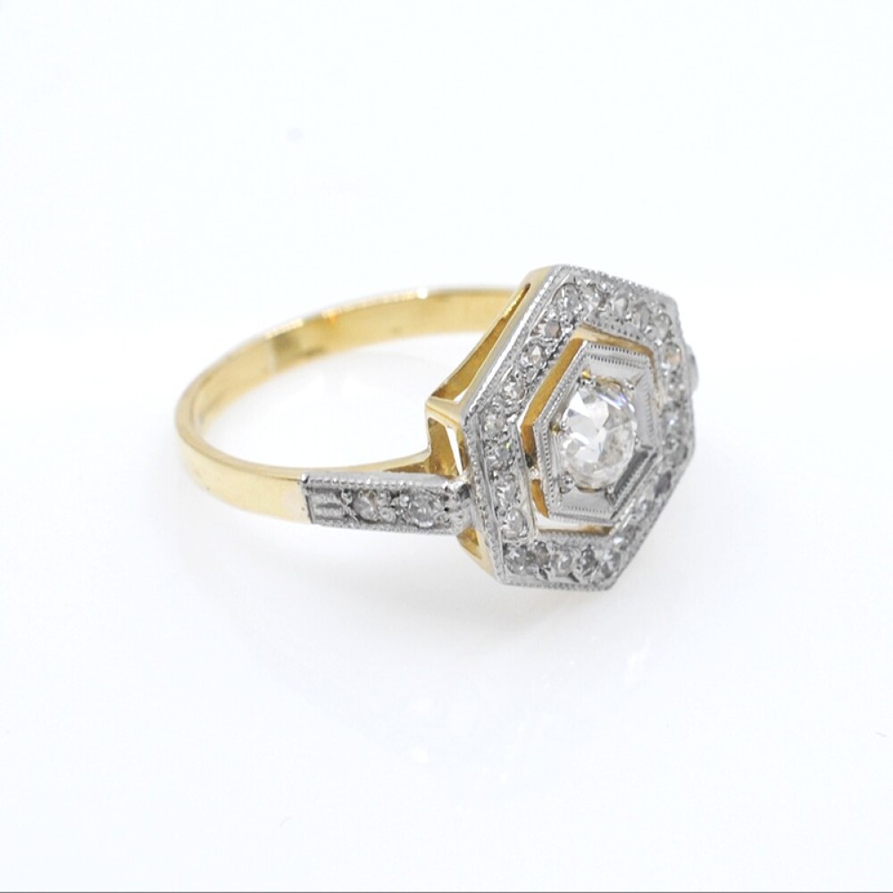 Anillo en oro 18k, platino y brillantes Anillo en oro 18k, platino y brillantes