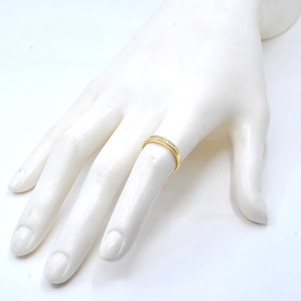 Anillo medio sin fin en oro 18k con 8 brillantes tallado princesa Anillo medio sin fin en oro 18k con 8 brillantes tallado princesa