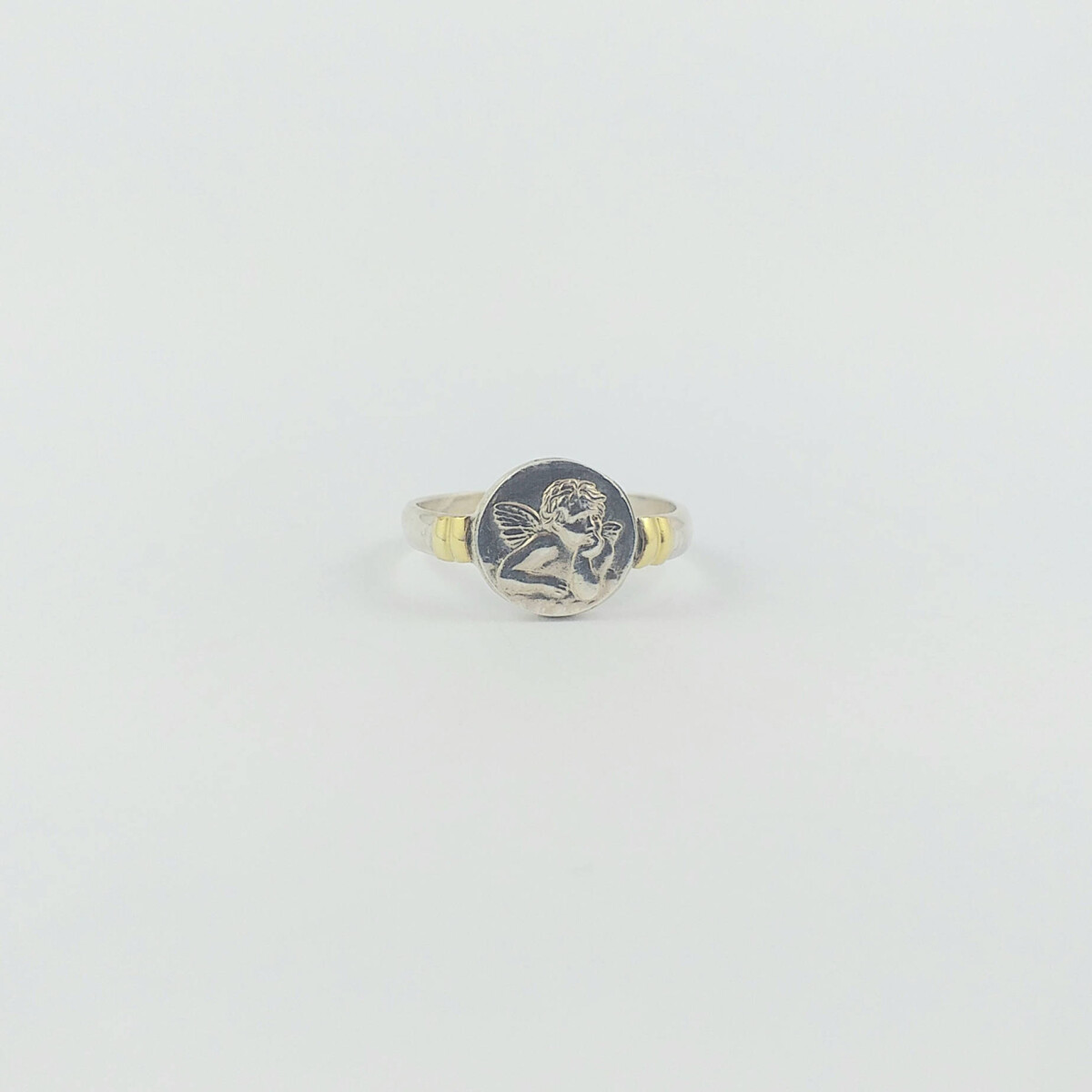 Anillo religioso de plata 925 y double en oro 18 ktes. 