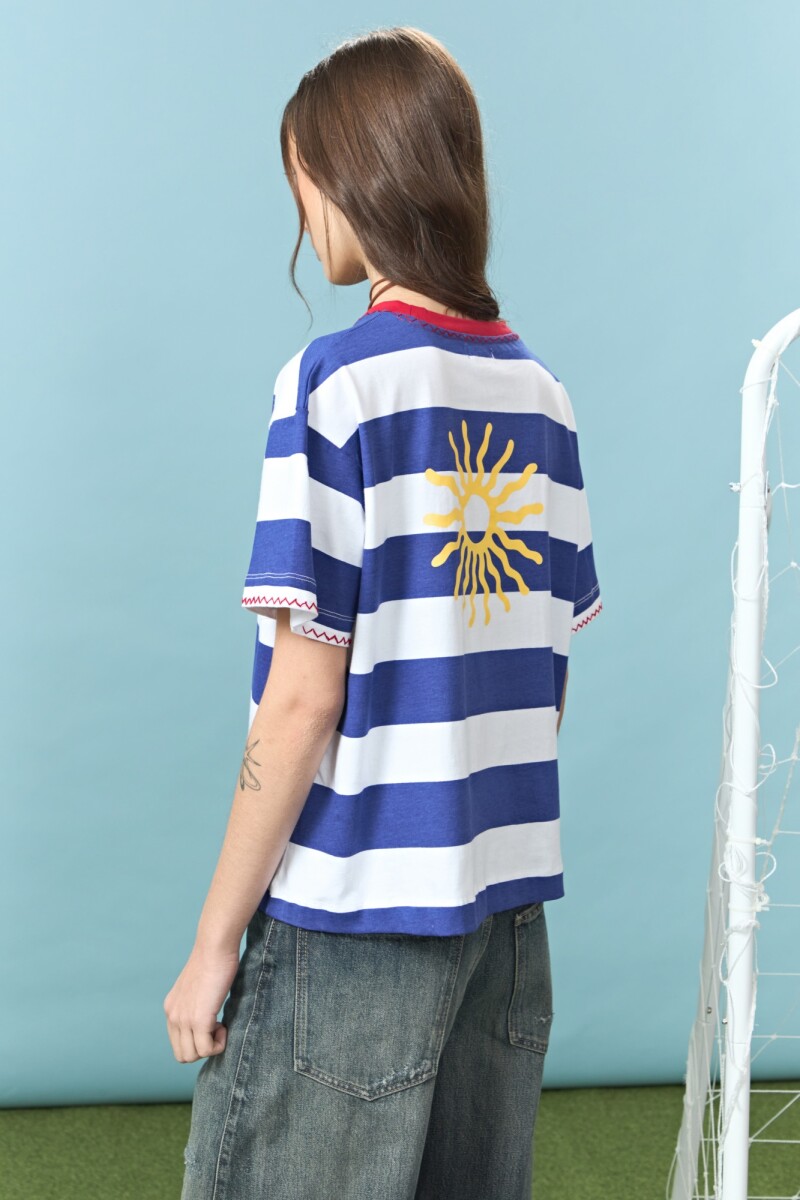 Remera rayada con bordado sol yorugua azul