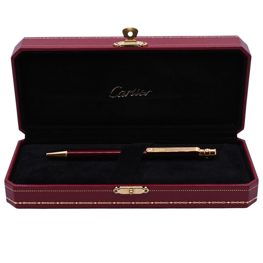 Lapicera Cartier Santos ST150190 Cuerpo bordeau año 2017 con estuche y papeles. Lapicera Cartier Santos ST150190 Cuerpo bordeau año 2017 con estuche y papeles.