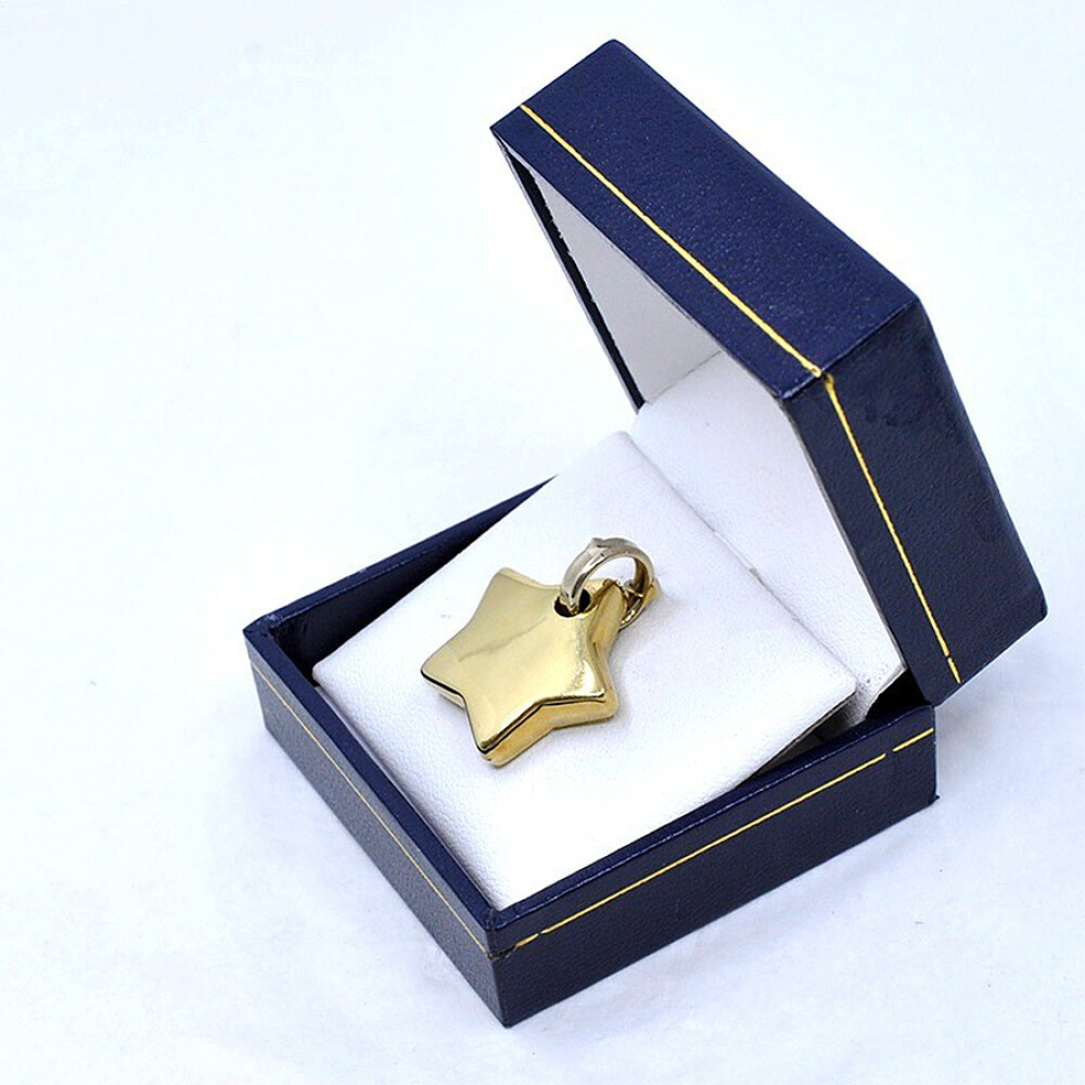 Dije en Oro 18 K Forma De Estrella Dije en Oro 18 K Forma De Estrella