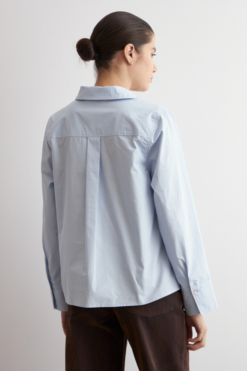 Blusa cuello camisa celeste
