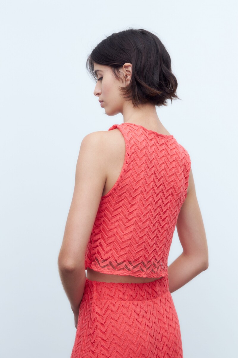 Blusa de encaje coral