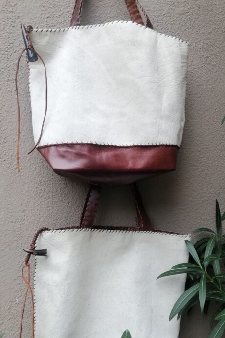 Taba Handbag Cowhide Claro