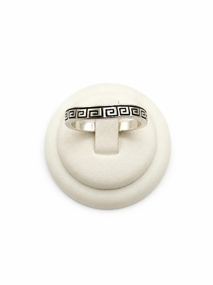 Anillo ondulado con guarda 