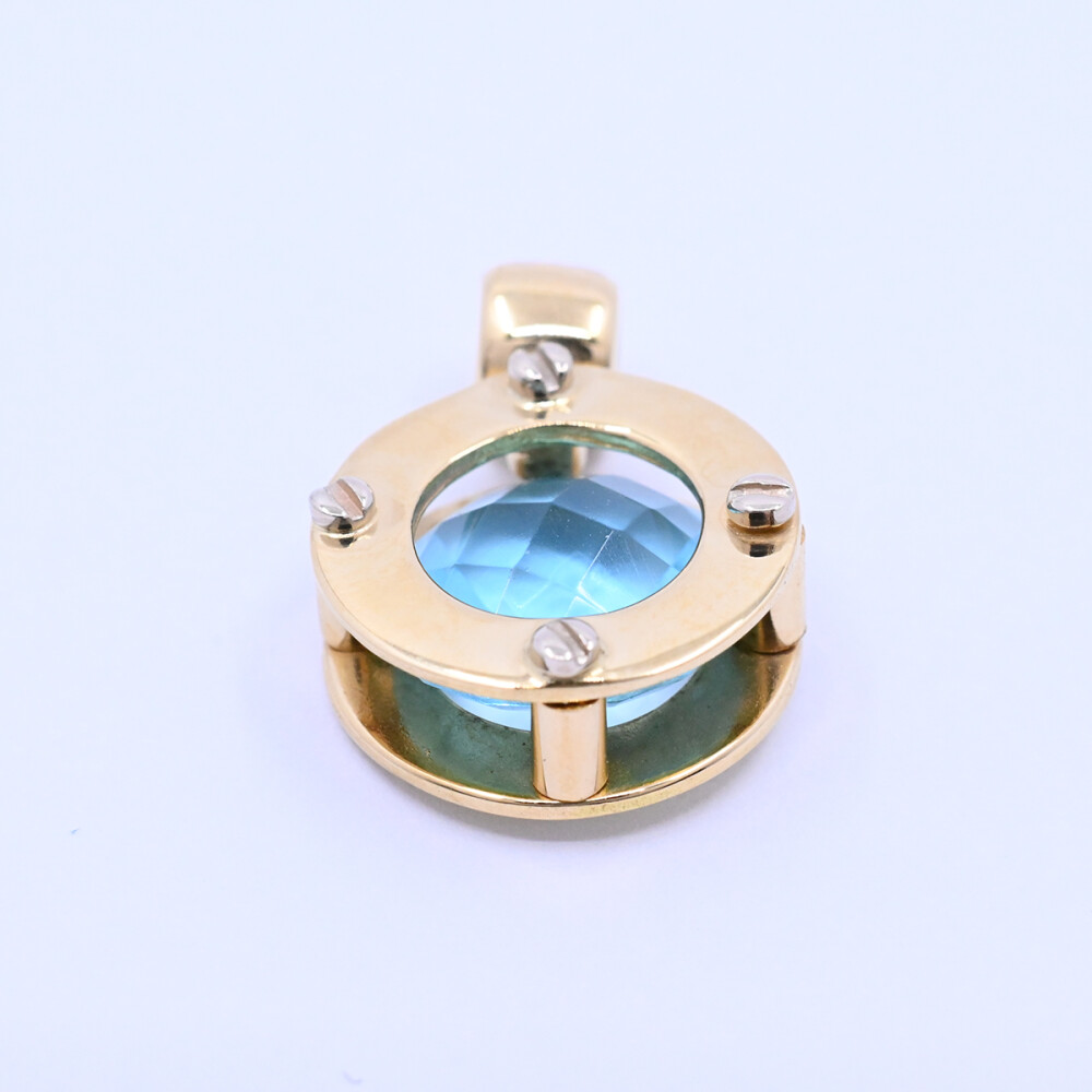 Colgante oro 18k 2 tonos con topacio azul. Colgante oro 18k 2 tonos con topacio azul.