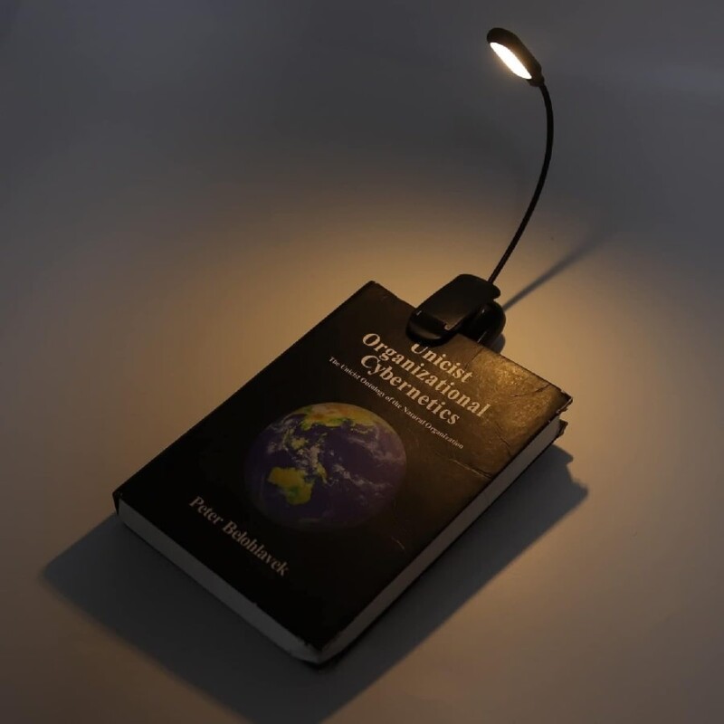 Luz LED para lectura de libros con clip sujetador Luz LED para lectura de libros con clip sujetador