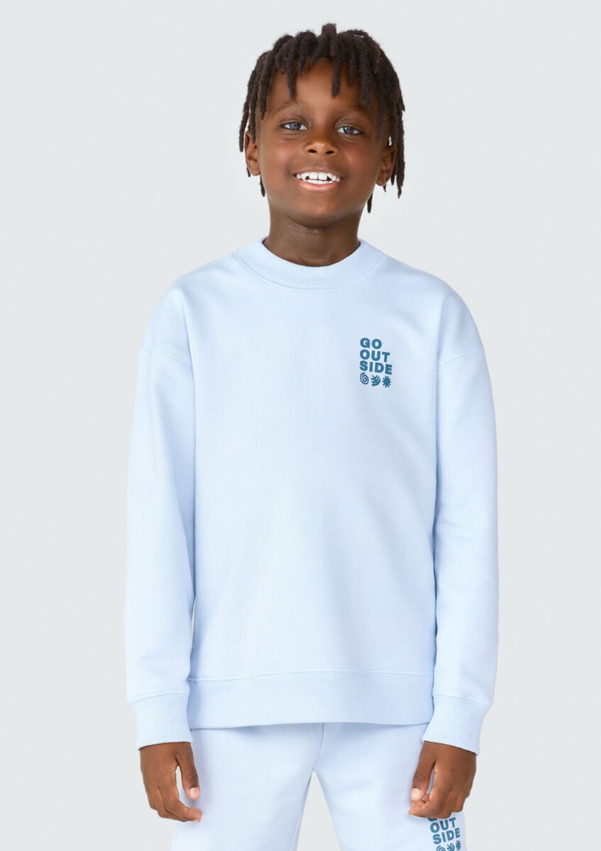 BUZO INFANTIL CON ESTAMPA MODELO OVERSIZE - CELESTE 