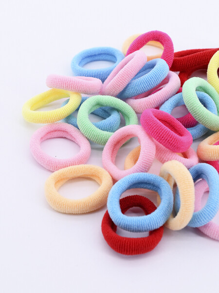 ESTUCHE CON GOMAS PARA PELO ESTAMPADO 2