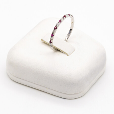 Anillo de oro 18ktes gris con brillante y rubí. Anillo de oro 18ktes gris con brillante y rubí.