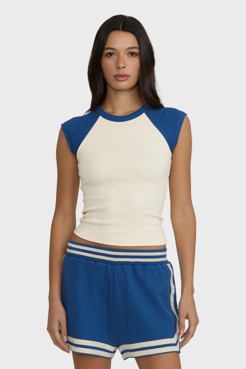 REMERA SURF CAMP SS RAGLAN N-amarillo