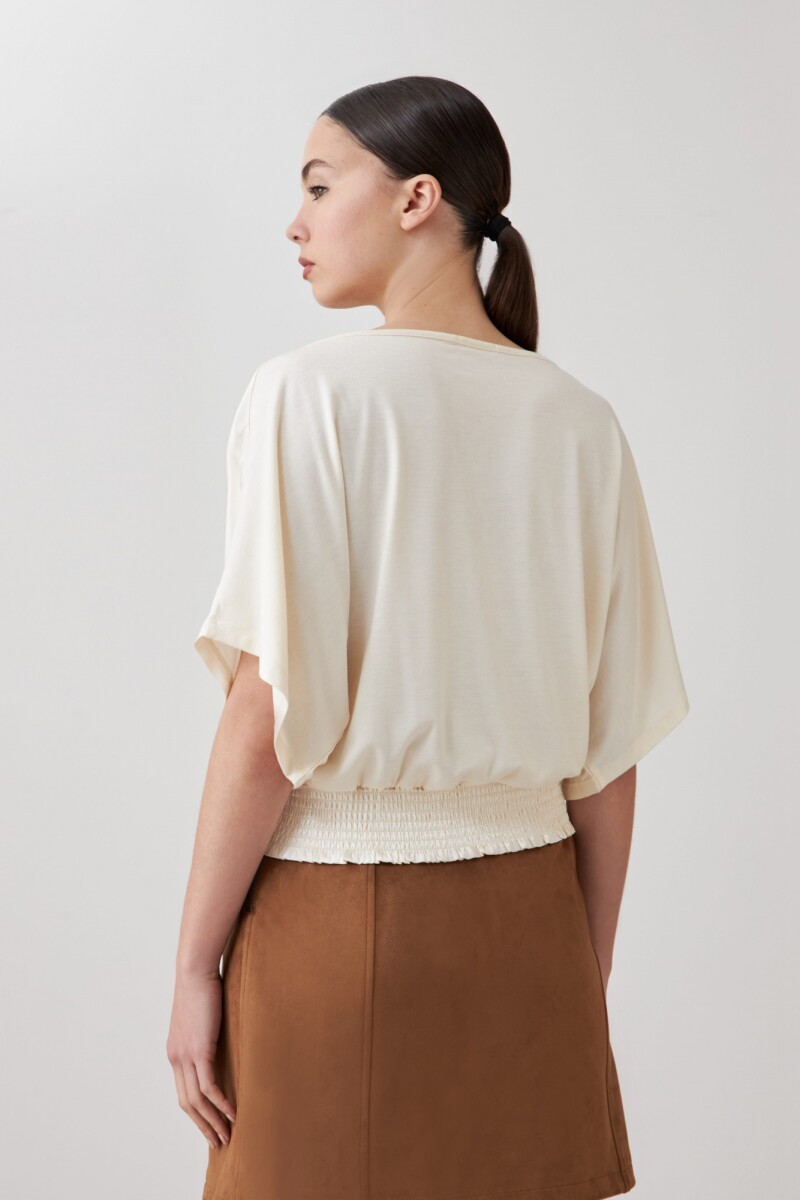 Blusa satinada beige