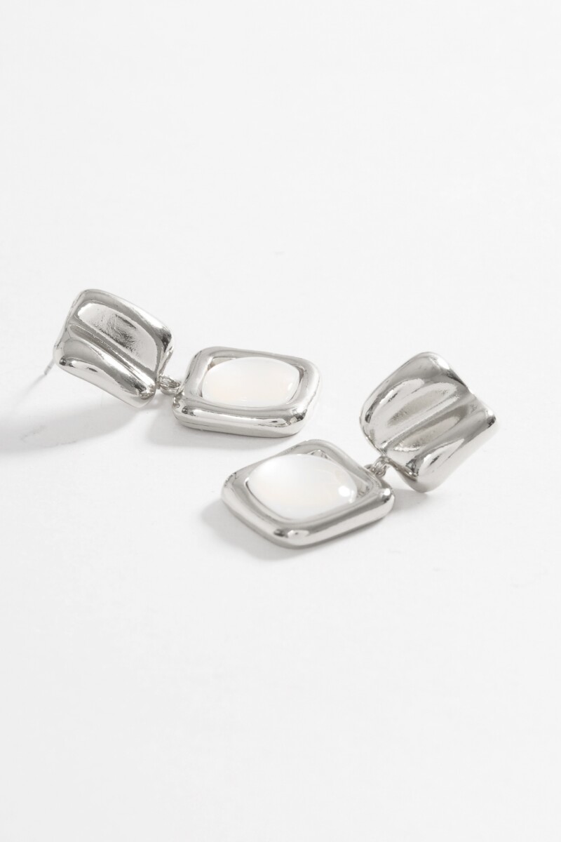 Caravanas metálicas dije nacarado plateado