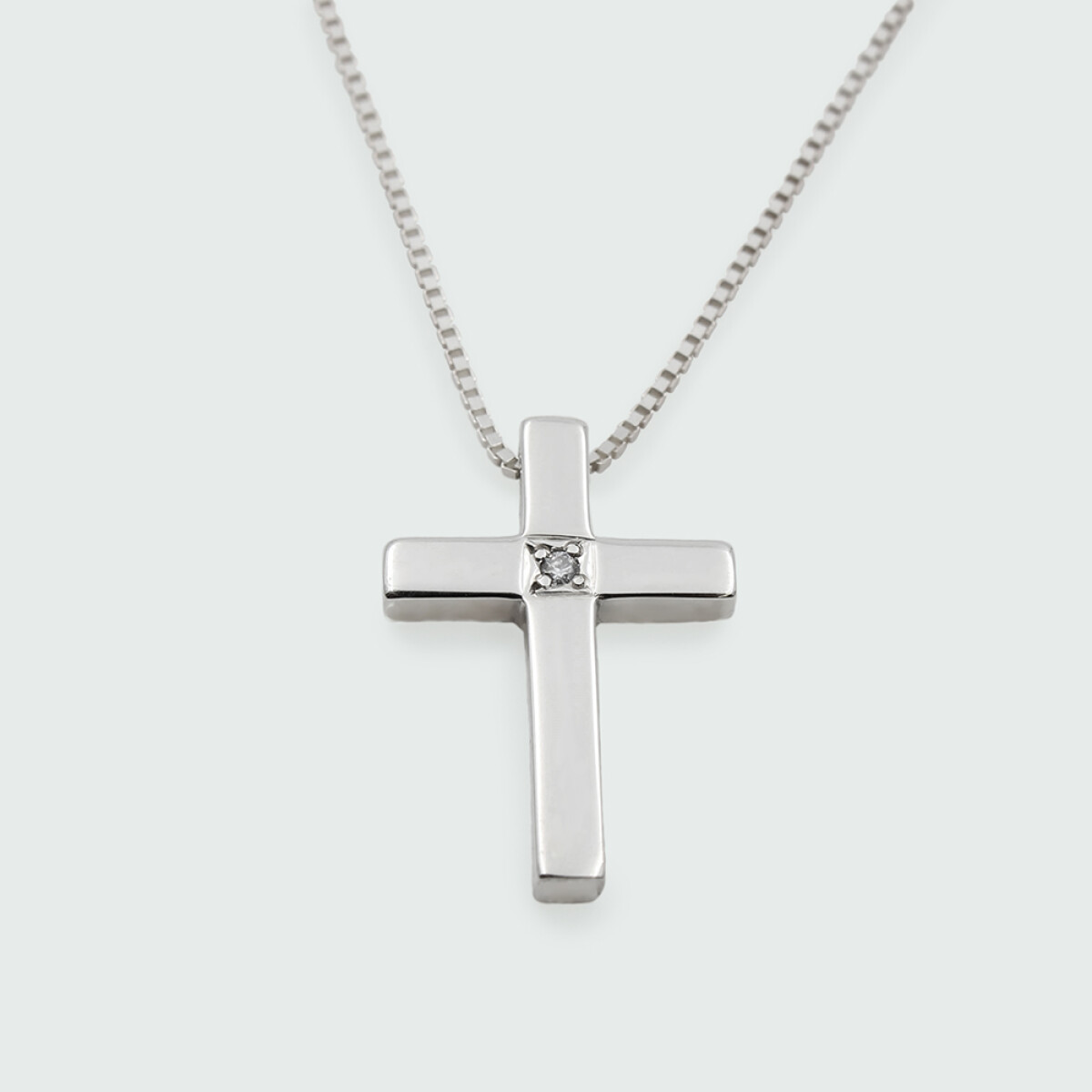 Cadena y cruz de plata 925 con brillante. 