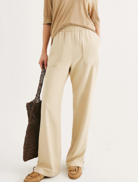 CALZA DE CINTURA ALTA BEIGE