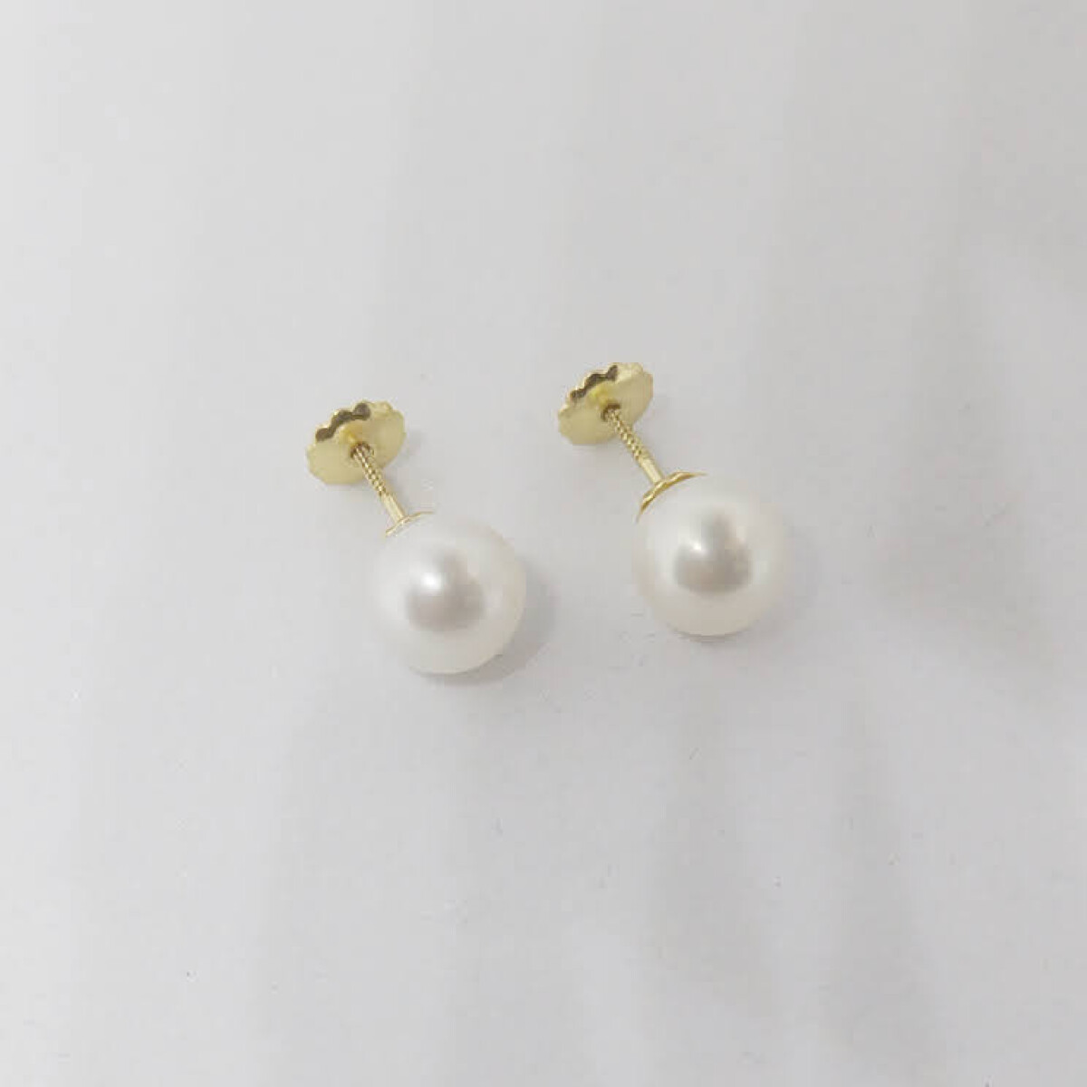 Caravanas de perlas de cultivo en oro 18kilates. 7.5 mm 