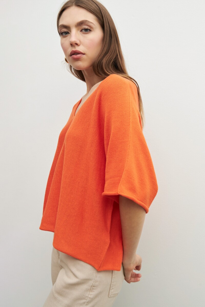 Sweater oversized escote V naranja