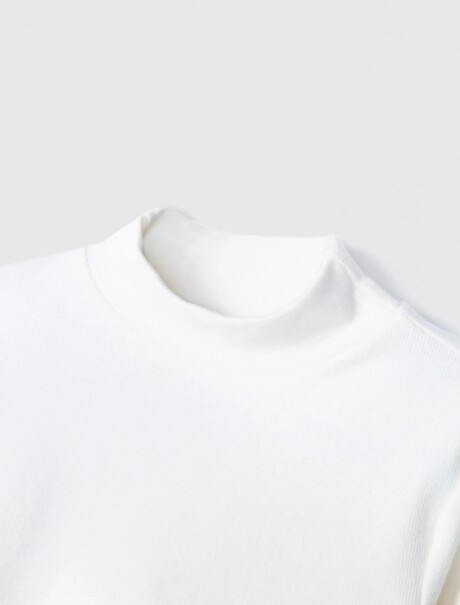 POLERA INFANTIL EN TELA ACANALADA BEIGE