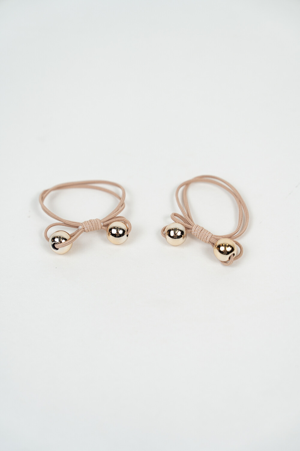 Gomita De Pelo Bell Set 2 Un. Marron