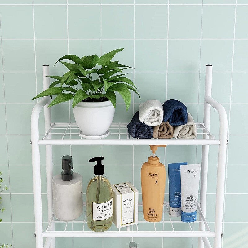 Estante mueble organizador sobre inodoro blanco