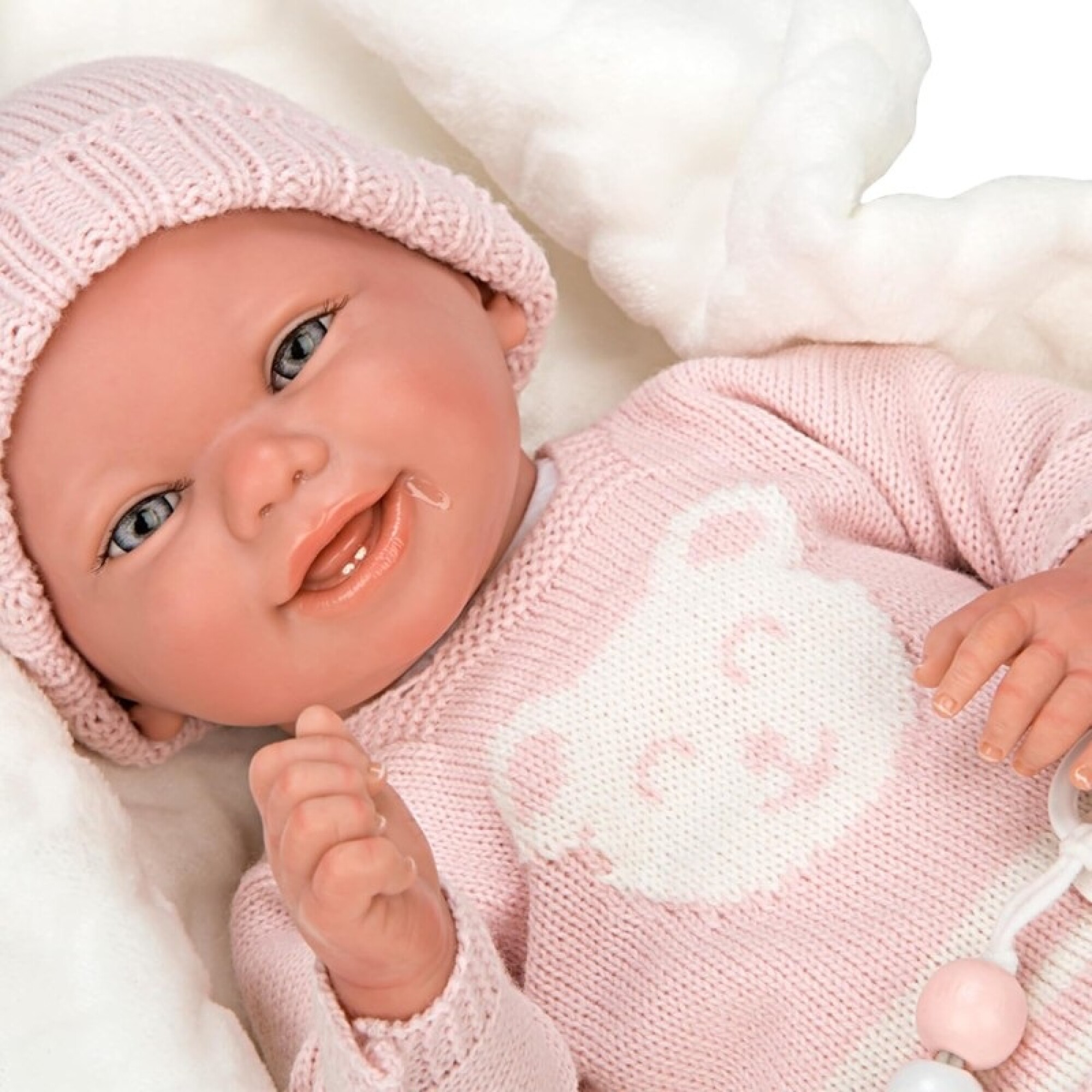 Muneca Reborn Adriana 40 cm con ropa de rayas rosas Jugueteria Gibernau
