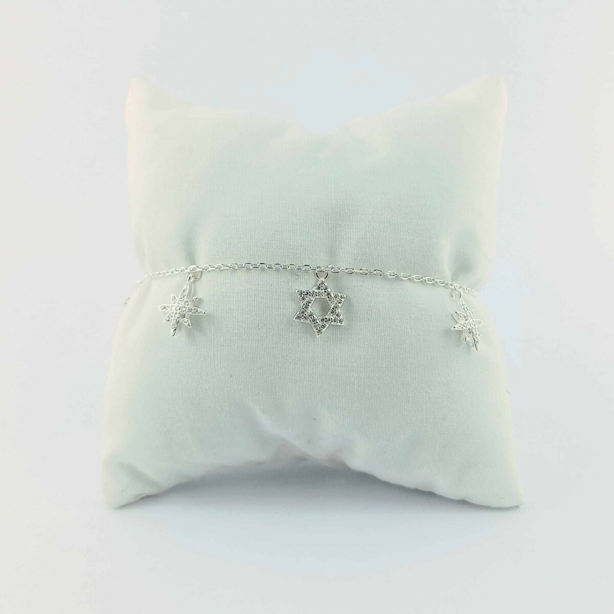 Pulsera de plata 925 con dijes y circonias. Estrellas. 