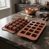 Molde silicona chocolate piramide 21x10.3x2 cms. Molde silicona chocolate piramide 21x10.3x2 cms.