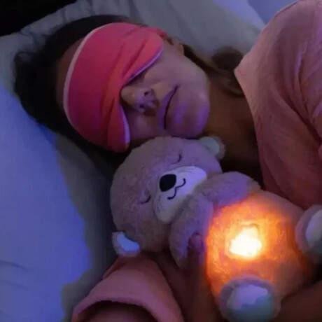 Oso de peluche con ruido blanco, luces y movimiento Rosado