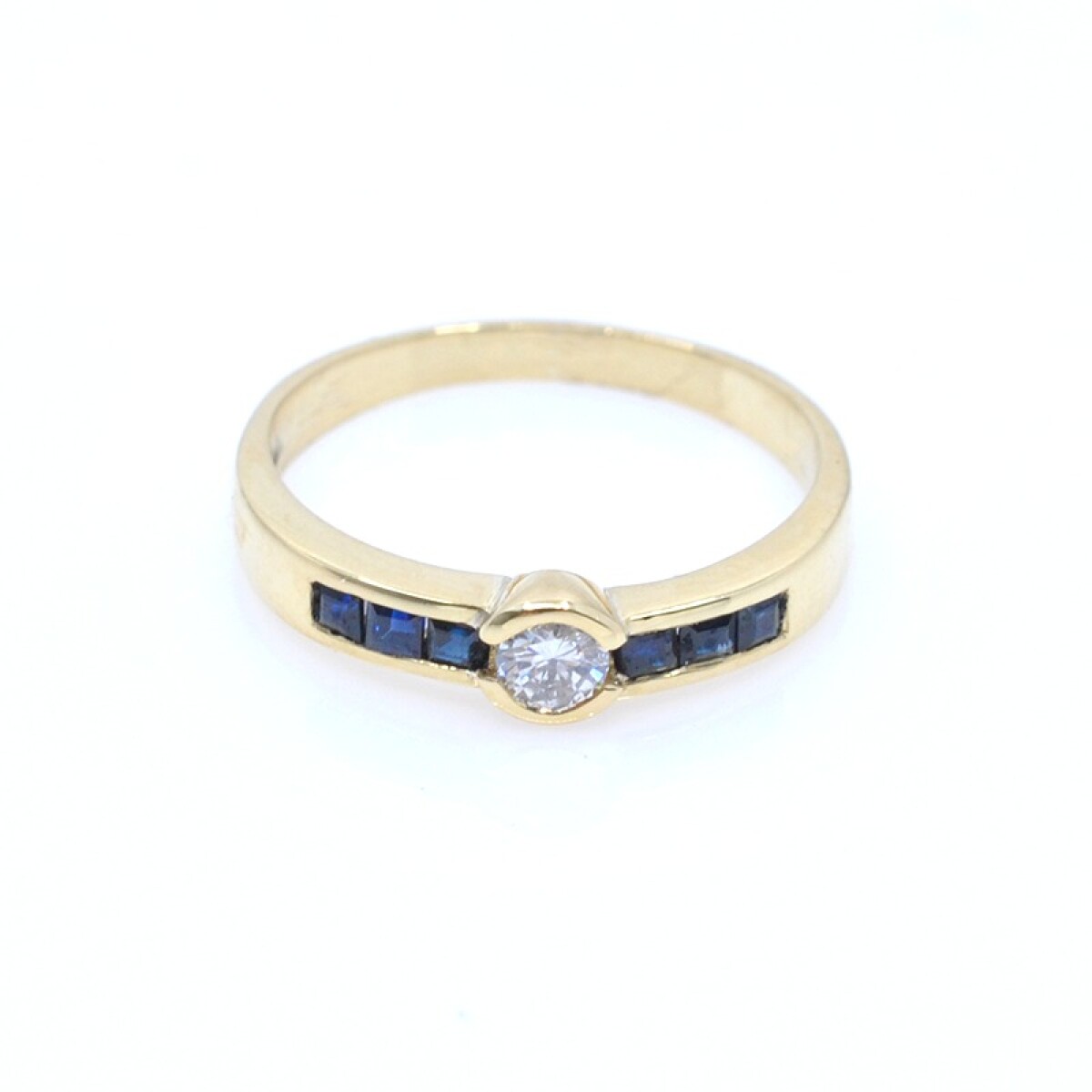 Anillo en oro 18k , brillante y zafiros 