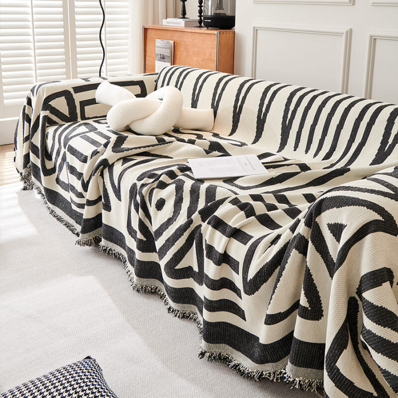 Manta sillon y cama triángulos 180x230cm negro