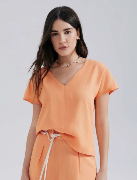 BLUSA MODELO REGULAR EN LINO NARANJA