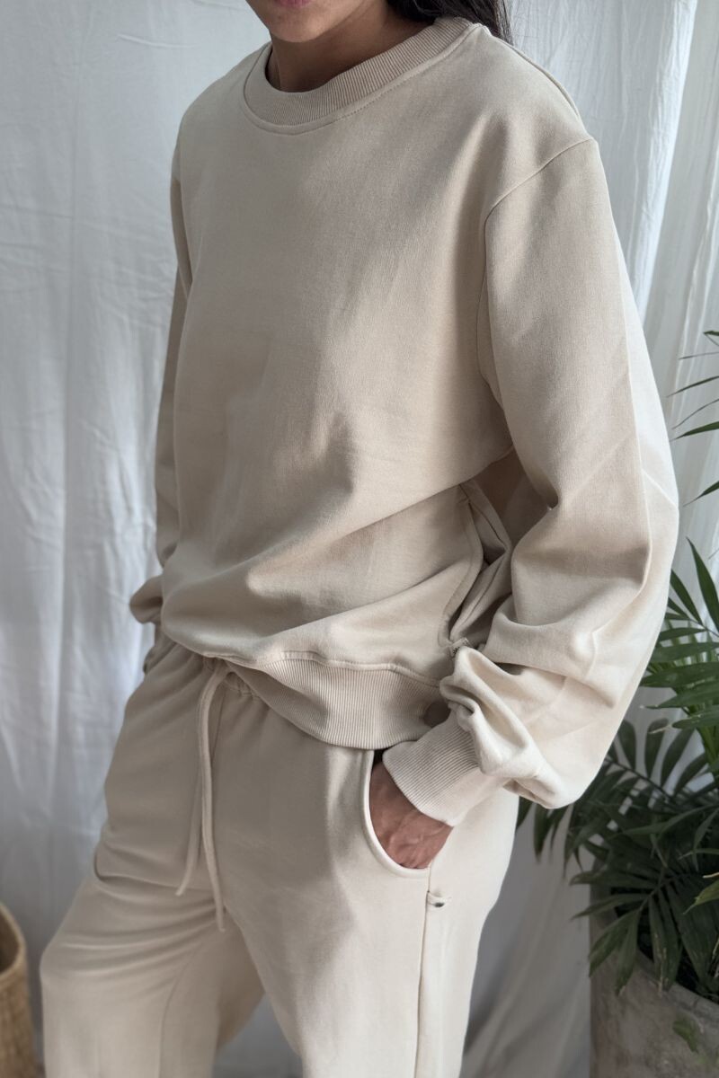 Buzo redondo Crema