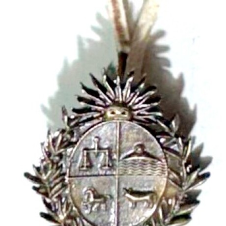 Dije del Emblema Nacional con tiento Dije del Emblema Nacional con tiento