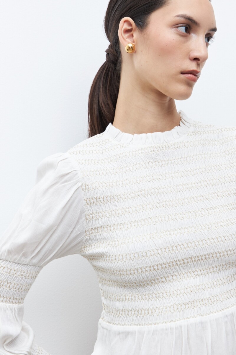 Blusa romántica crudo