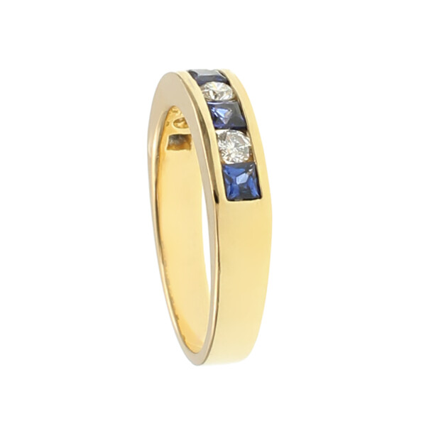 Anillo medio sin fin chana Bicolor en oro amarillo 18k con brillantes y zafiros Anillo medio sin fin chana Bicolor en oro amarillo 18k con brillantes y zafiros