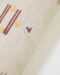 Almohadón Bibiana de lana y algodón beige con estampado marrón y terracota 30 x 50 cm