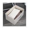 Mueble organizador con 5 cestos en tela Selecta Mueble organizador con 5 cestos en tela Selecta