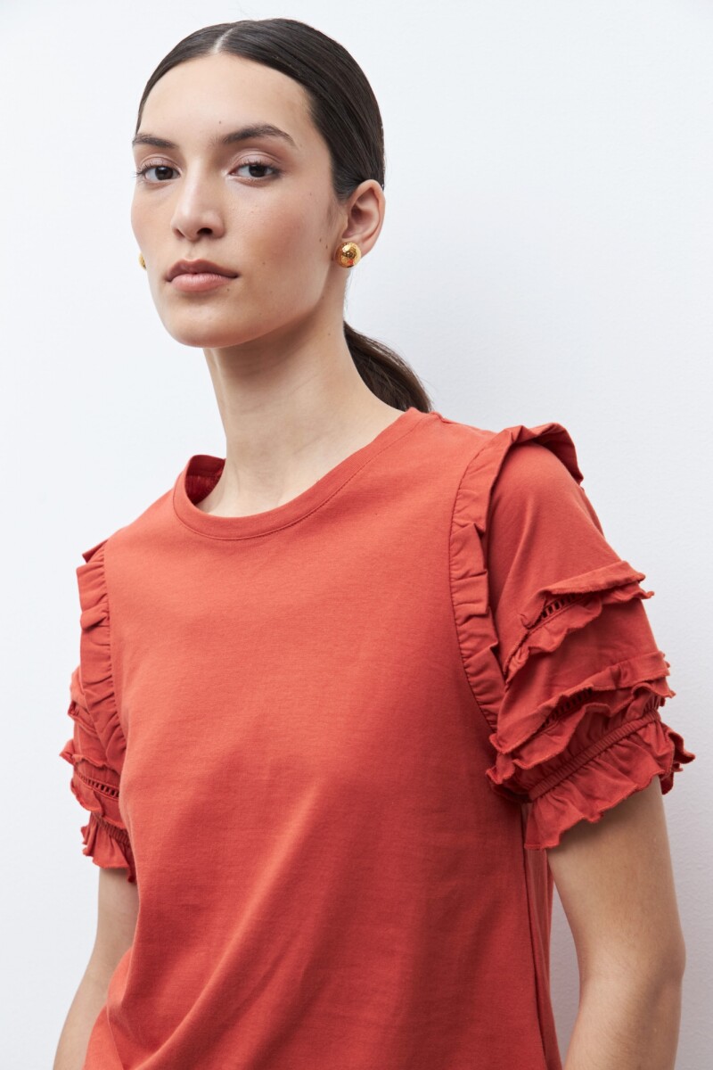 Remera mangas abullonadas lacre