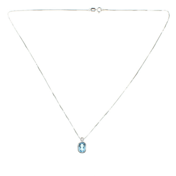 Colgante Silvia de oro blanco 18k con brillante y topacio azul. Incluye cadena 4