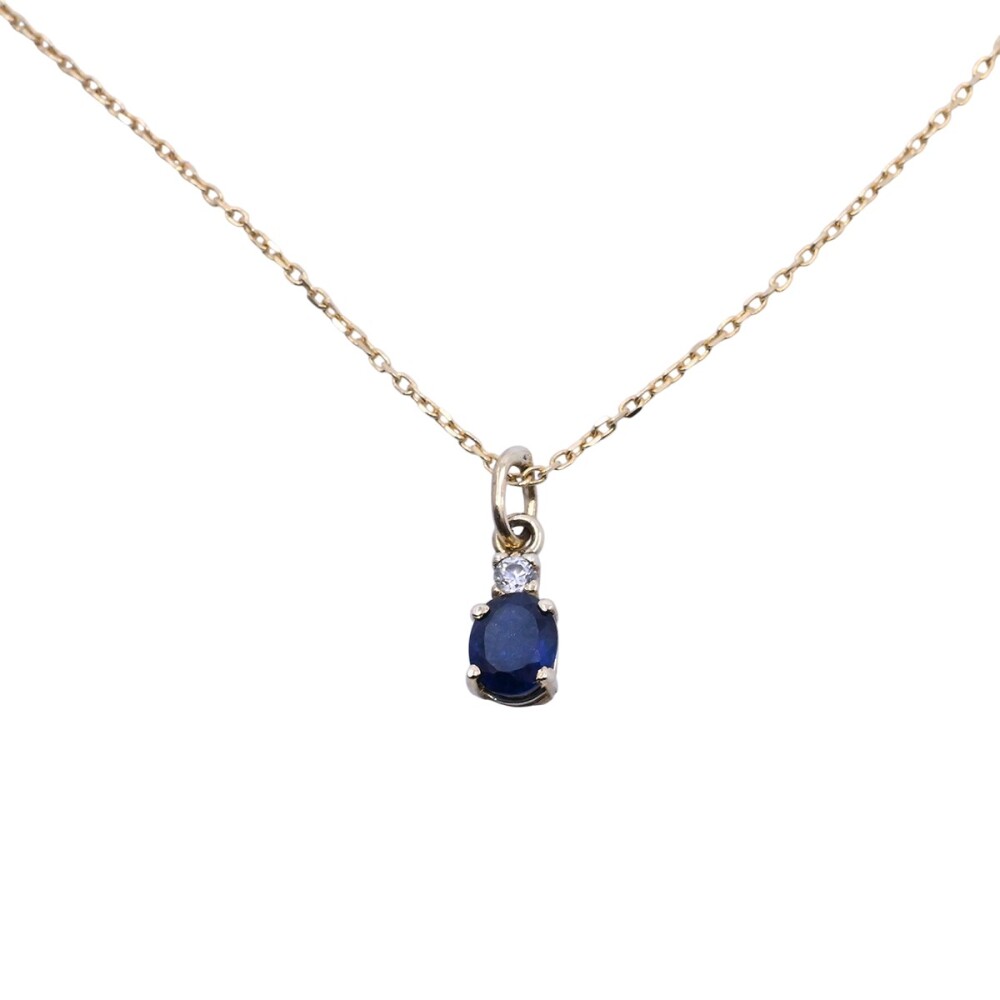 Colgante oro 18k con zafiro oval y zirconia. Colgante oro 18k con zafiro oval y zirconia.