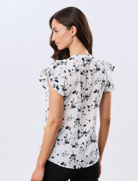 BLUSA CON VOLADOS Flor