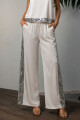 PANTALON P233/25 ENGOMADO CON AÑADIDO DE LENTEJUELAS Marfil