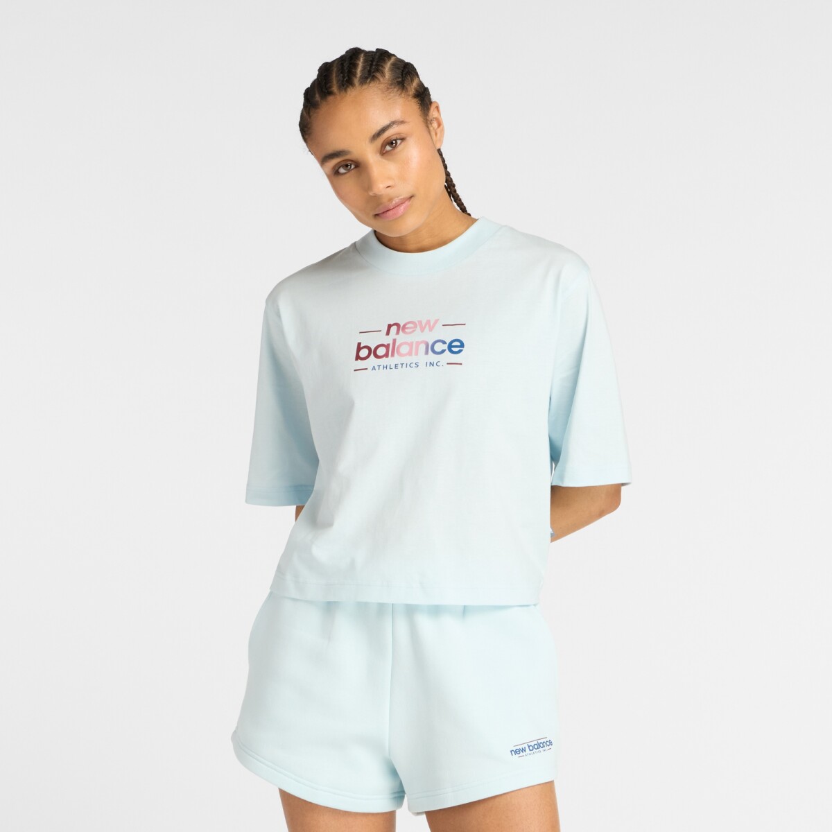 Remera New Balance de Dama - Reimagined Relaxed - WT53536FRL - BLUE 