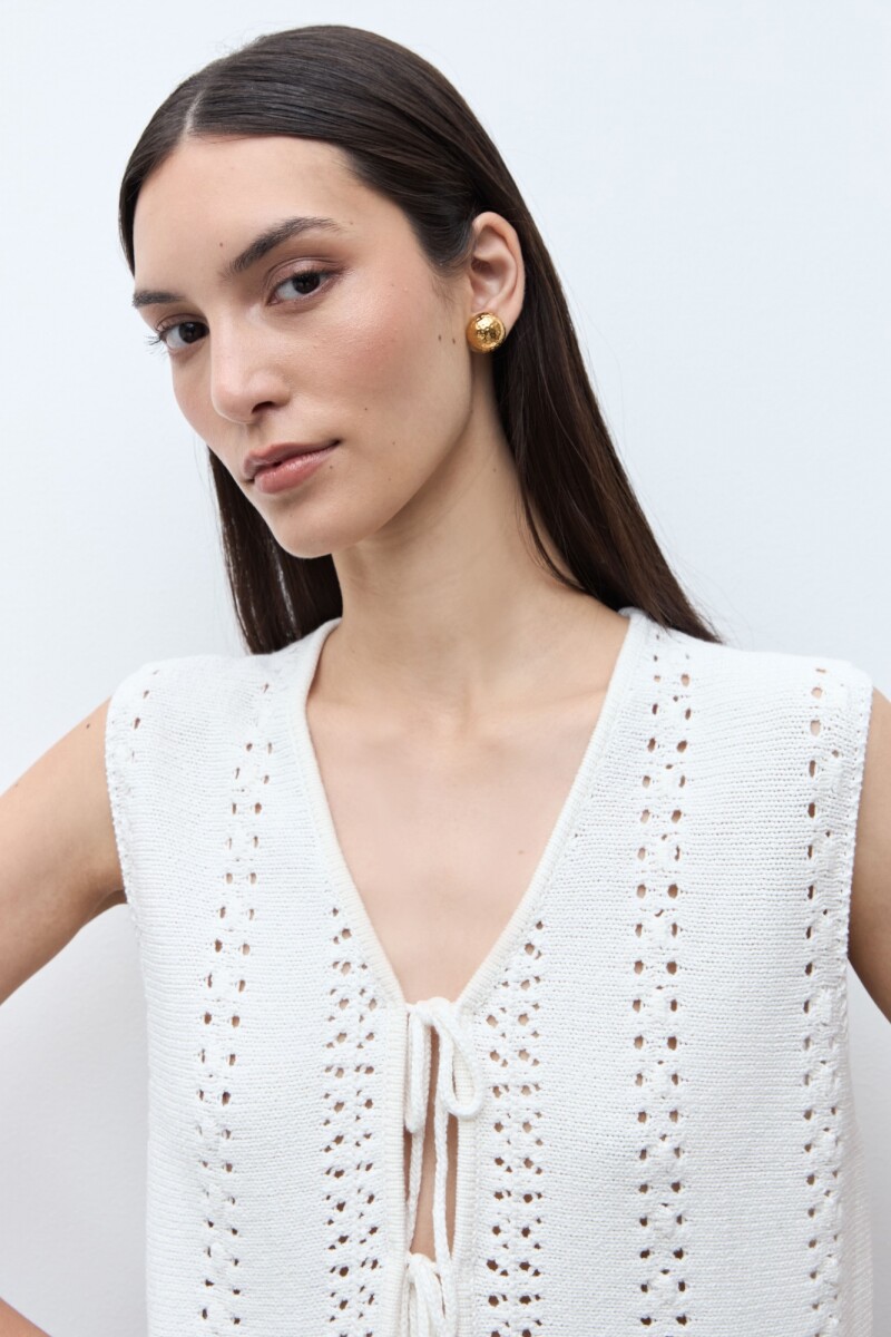 Chaleco tejido con lazos crudo