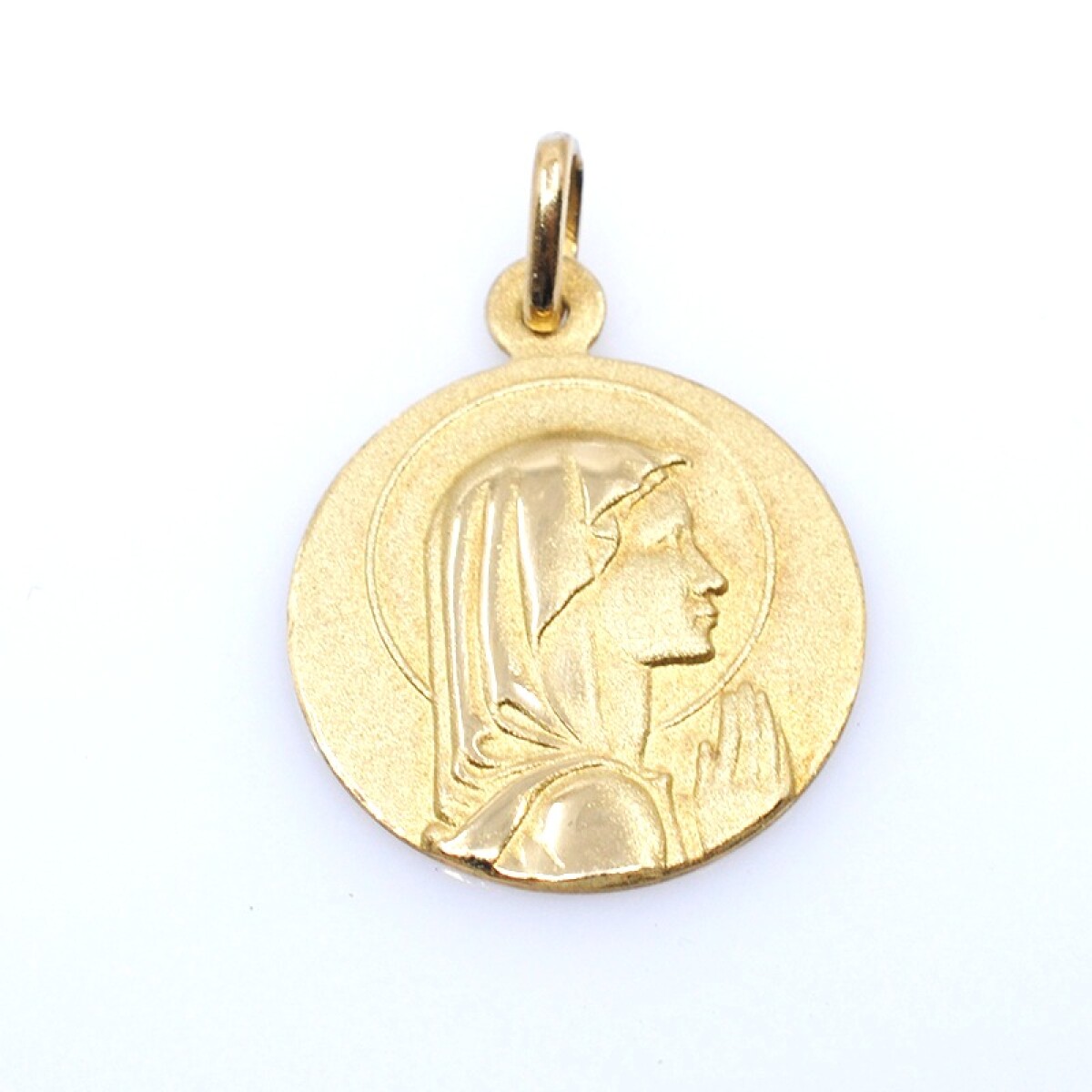 Medalla en oro 18k amarillo, con virgen. Diámetro 18mm 