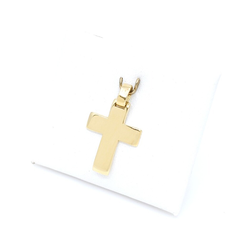 Cruz en oro 18k bombe. Medidas 2 x 1,5mm aproximadamente Cruz en oro 18k bombe. Medidas 2 x 1,5mm aproximadamente