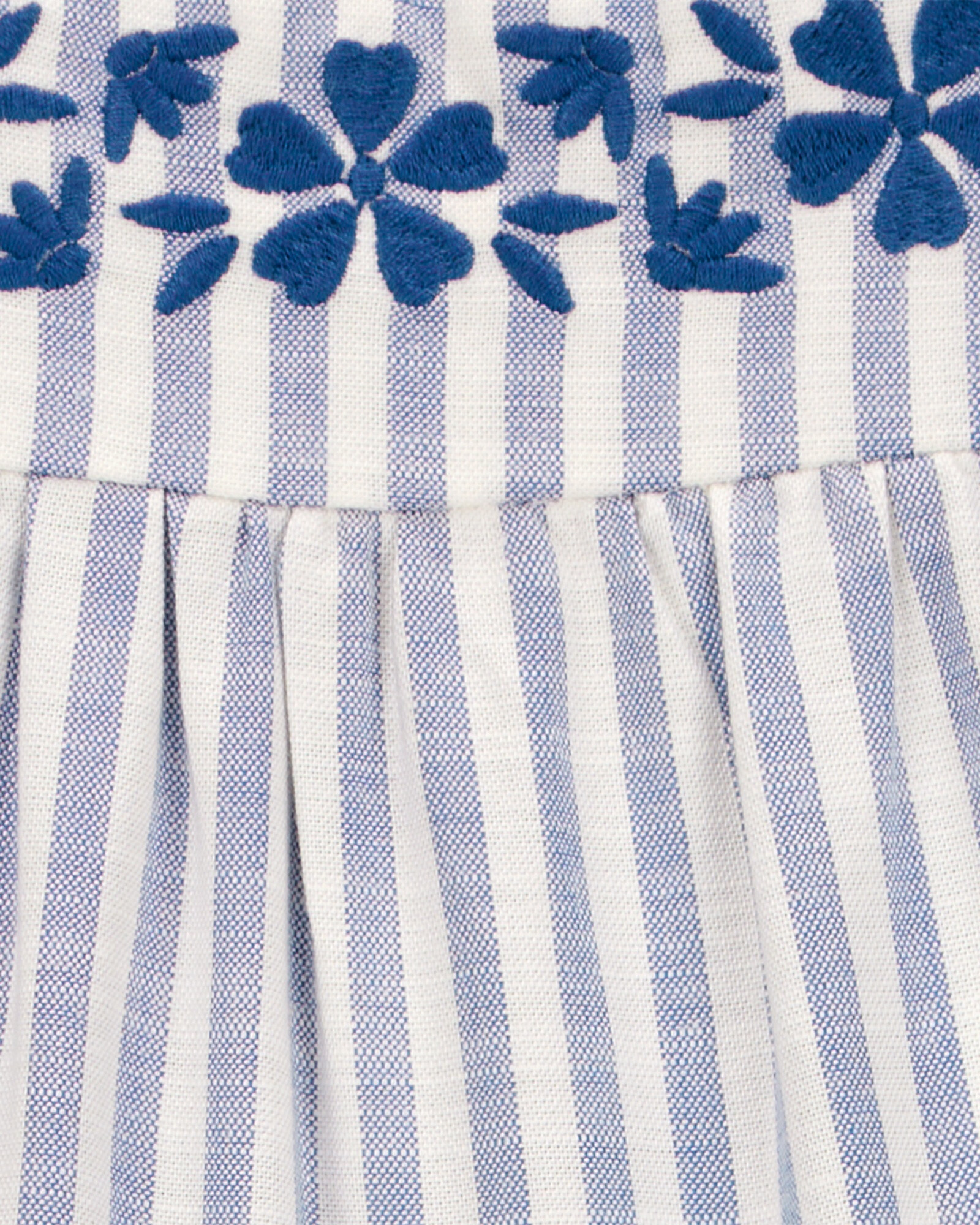 Monito corto de viscosa, canesú bordado, diseño a rayas Monito corto de viscosa, canesú bordado, diseño a rayas