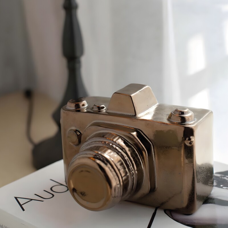 CAMARA DECORATIVA 15x13x11CM DORADO CAMARA DECORATIVA 15x13x11CM DORADO