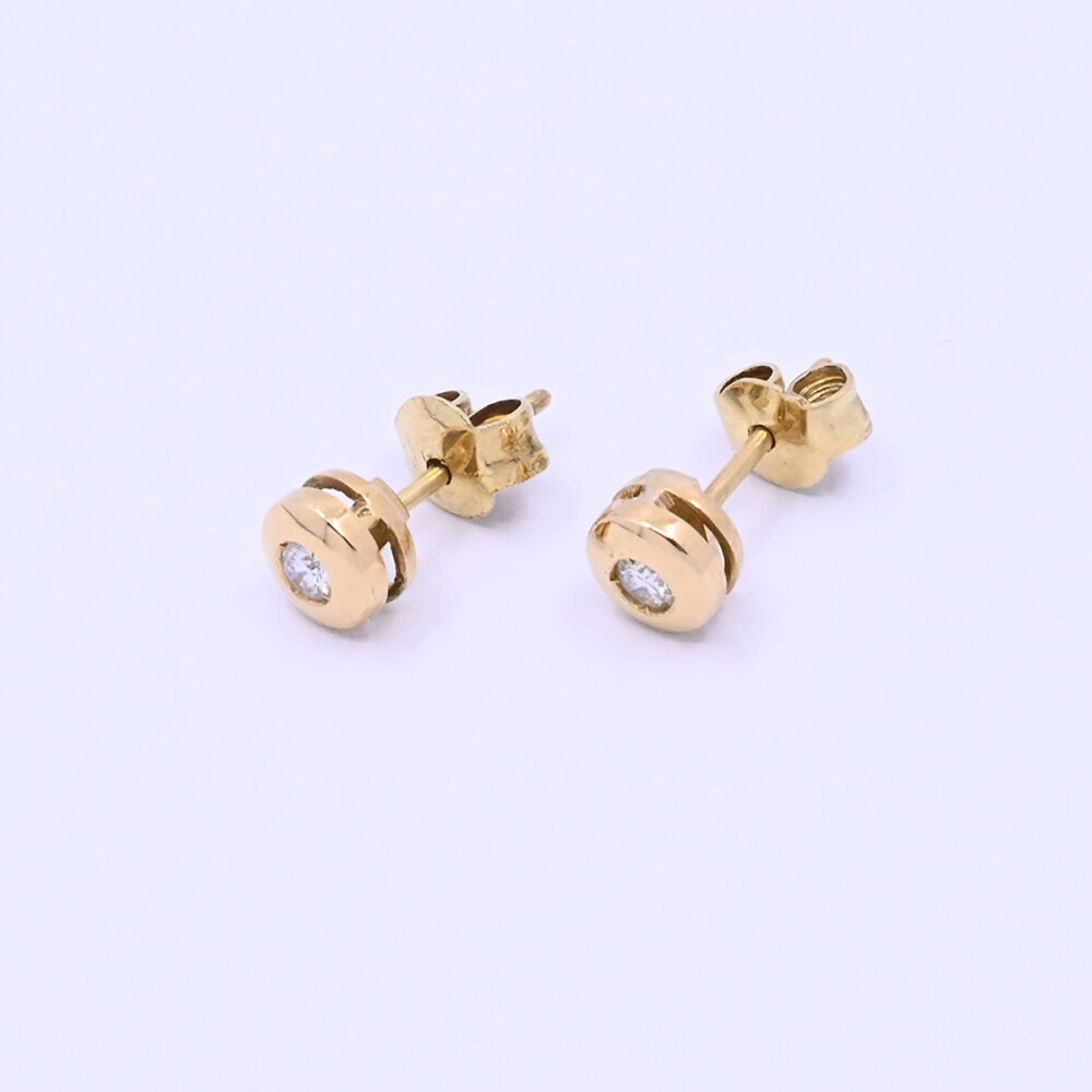 Caravanas oro 18k y brillantes Caravanas oro 18k y brillantes
